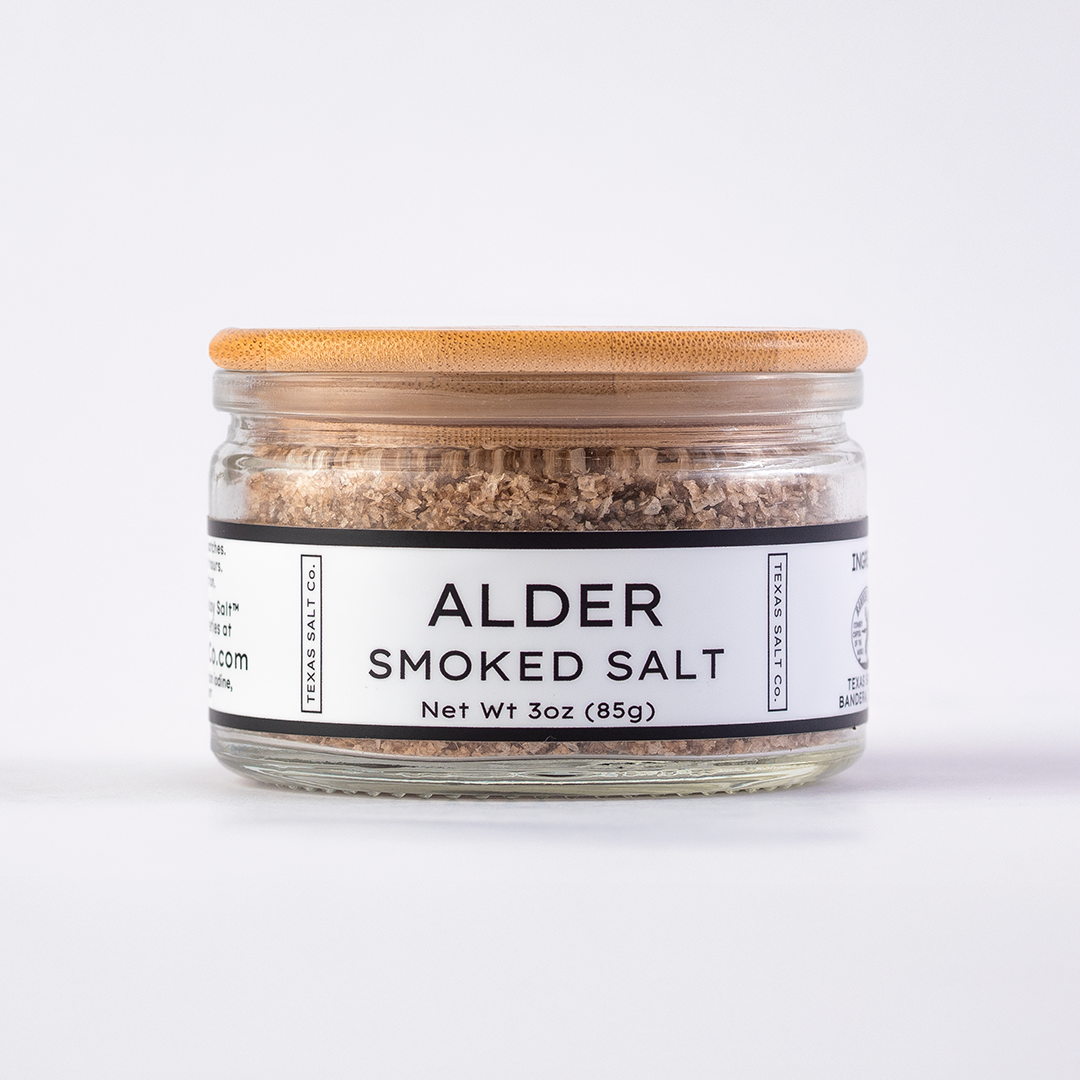 Texas Salt Co. Alder Smoked Salt 3oz bamboo-lid jar with visible smoked salt texture inside, photographed on a white background.