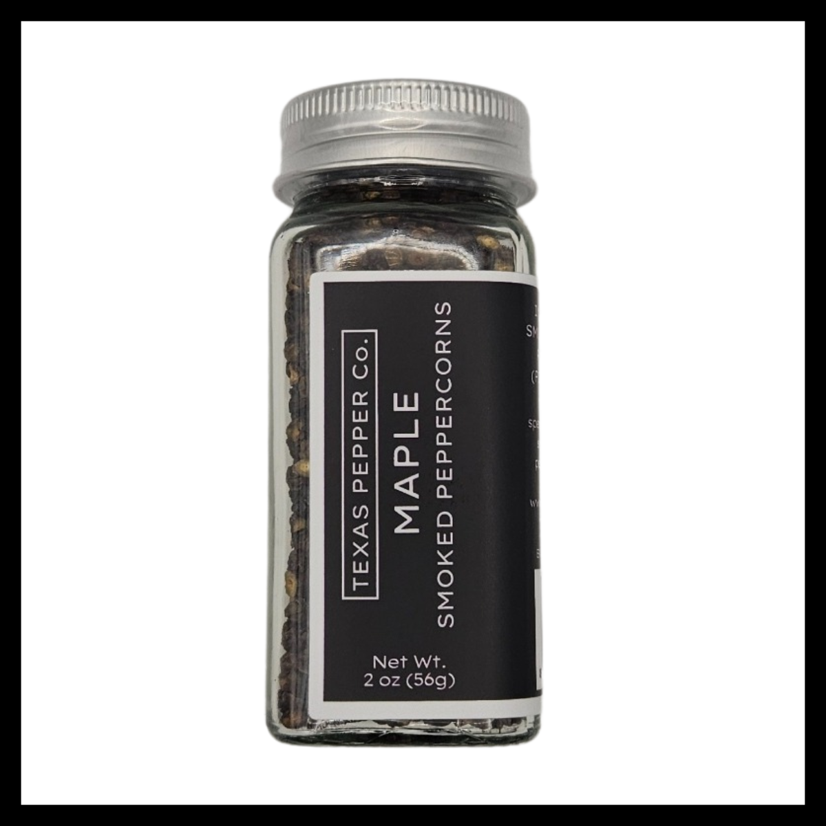 Texas Salt Co. Maple Smoked Peppercorn – 2 oz glass jar of black peppercorns cold-smoked over maple wood for a subtly sweet, bold flavor perfect for pork, eggs, or elevated everyday meals