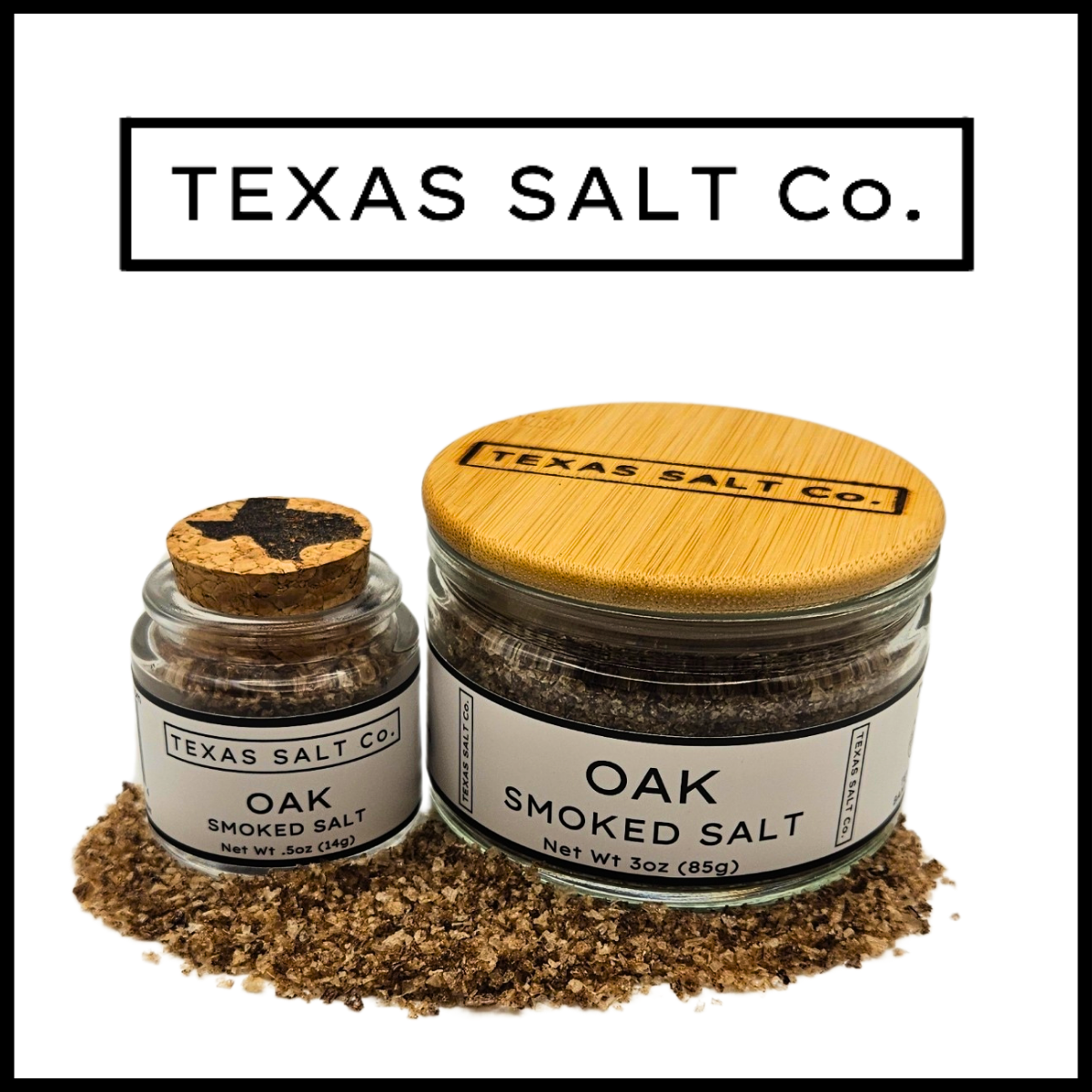 Texas Salt Co. Oak Smoked Salt – two glass jars in .5oz cork-top and 3oz bamboo-lid pinch jar sizes, with oak-smoked sea salt spilling naturally for a rustic gourmet display