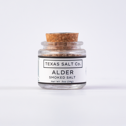 Texas Salt Co. Alder Smoked Salt .5oz cork-top glass jar shown straight on against a clean white background.
