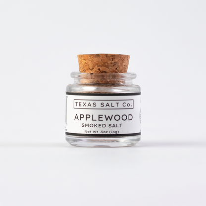 Texas Salt Co. Applewood Smoked Salt .5oz cork-top glass jar shown straight on against a clean white background.