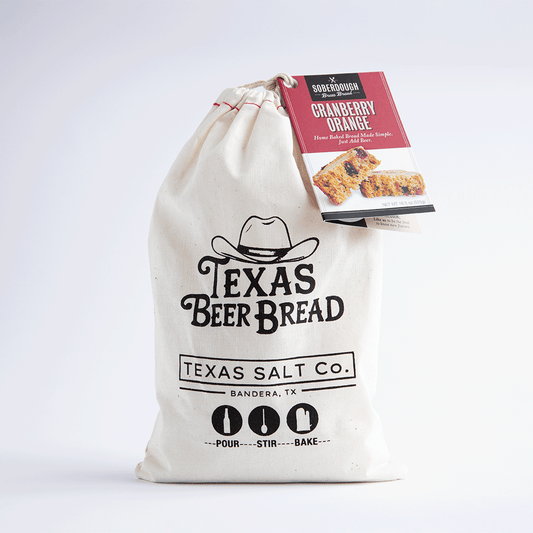 Texas Beer Bread mix in a drawstring bag, labeled Cranberry Orange flavor, with SoberDough tag attached