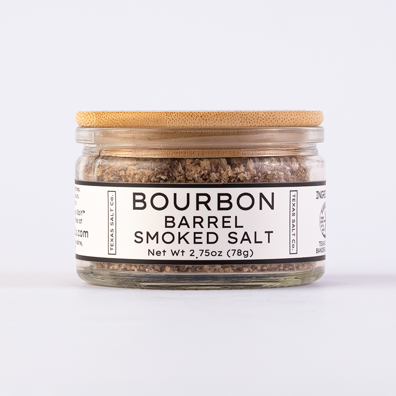 Texas Salt Co. Bourbon Barrel Smoked Salt in a 2.75oz glass jar with bamboo lid and front label.
