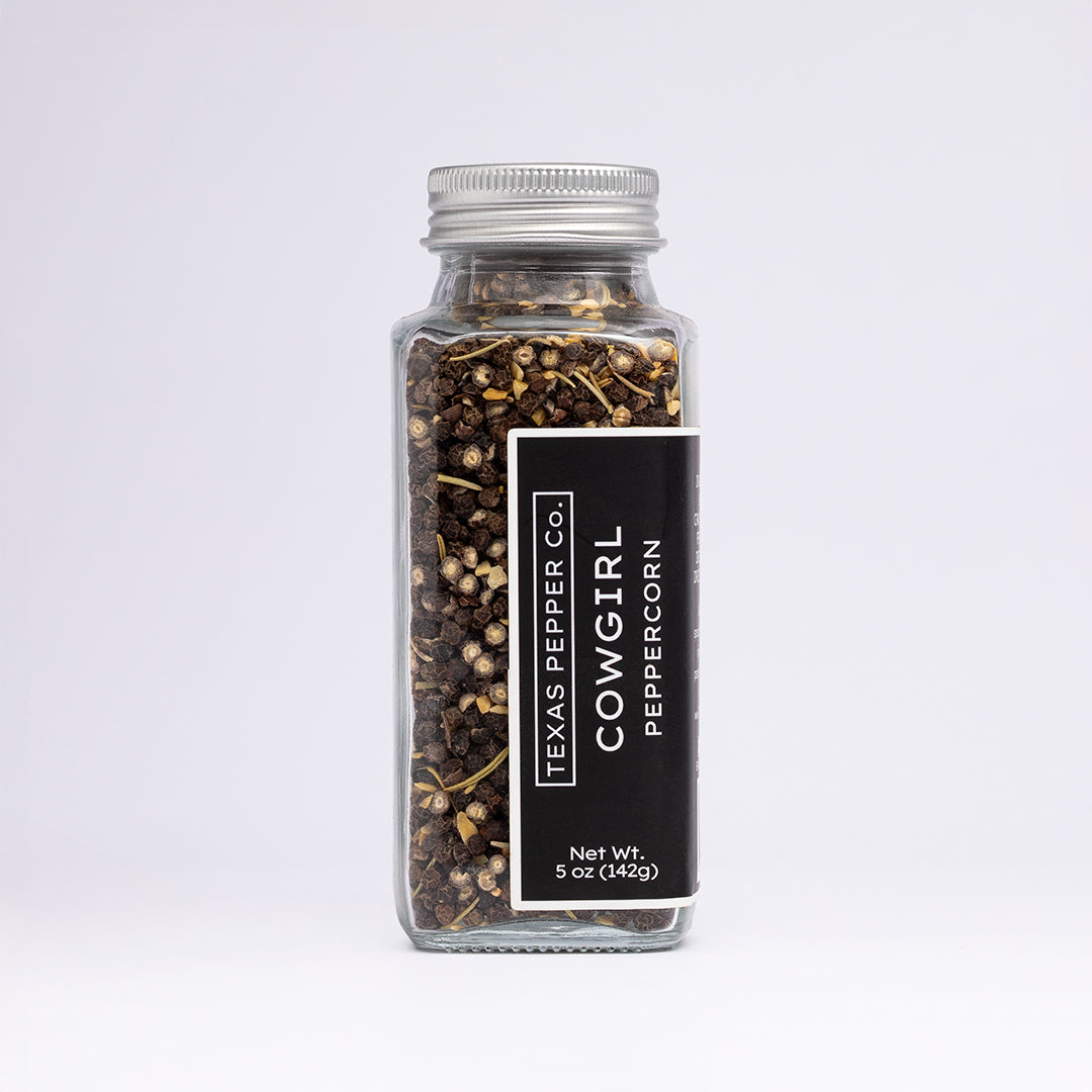 Texas Pepper Co. Cowgirl Peppercorn blend in a 5 oz (142g) glass jar with silver lid and black label.