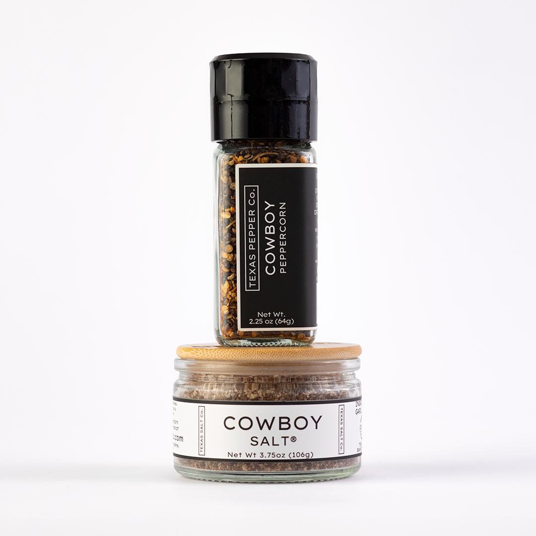 Two spice jars labeled 'Cowboy Pepper' and 'Cowboy Salt' by Texas Pepper Co. on a white background.