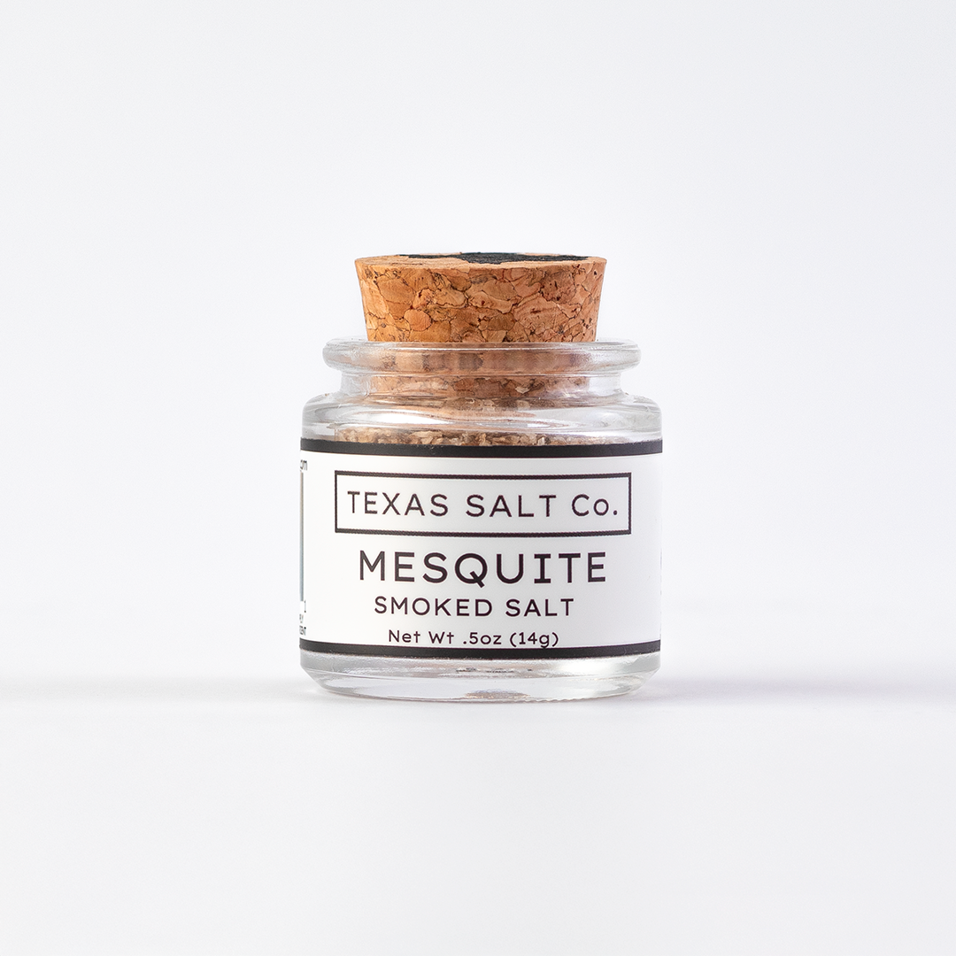Texas Salt Co. Mesquite Smoked Salt .5oz cork-top glass jar shown straight on against a clean white background.