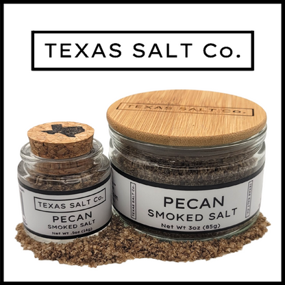 Texas Salt Co. Pecan Smoked Salt – glass cork-top and bamboo-lid pinch jars filled with rich, nutty pecan wood–smoked sea salt, perfect for grilling, roasted veggies, and charcuterie boards